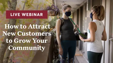 Two women talking outside of class. 