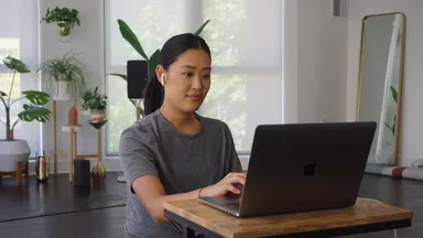 Girl looking at laptop