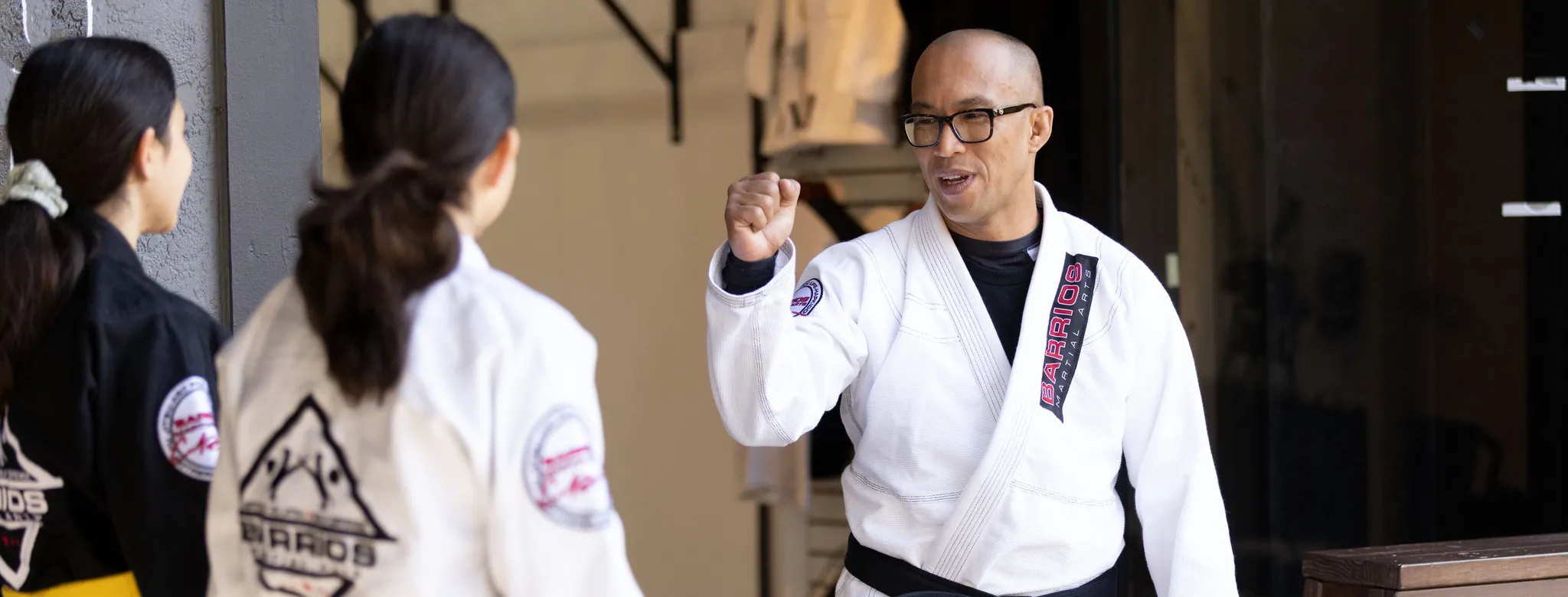 Martial arts instructor and students