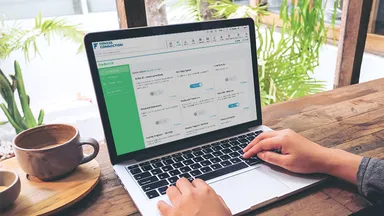 Person building emails on their computer. 