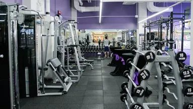 Gym with various machines and weights