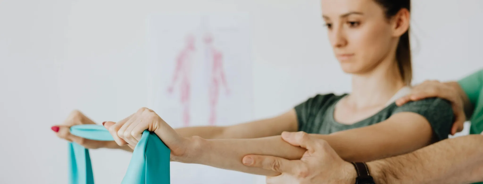 A woman stretching with a stretch band