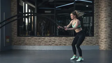 A woman working out in the gym. 