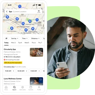 Man using ClassPass app on his phone